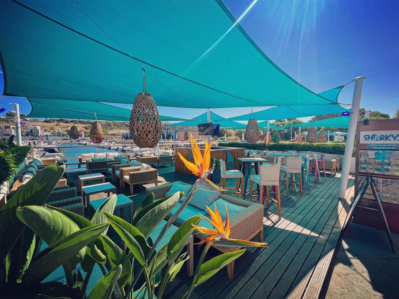 Sharky's Bar outdoor deck with marina view